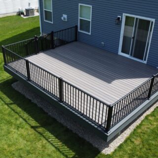 Trex naturals with Westbury aluminum railing.