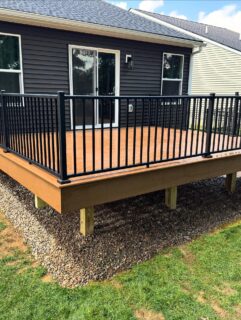 Trex naturals with Westbury aluminum railing.